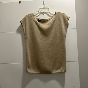 Gold shirt. Never been worn. Size large.